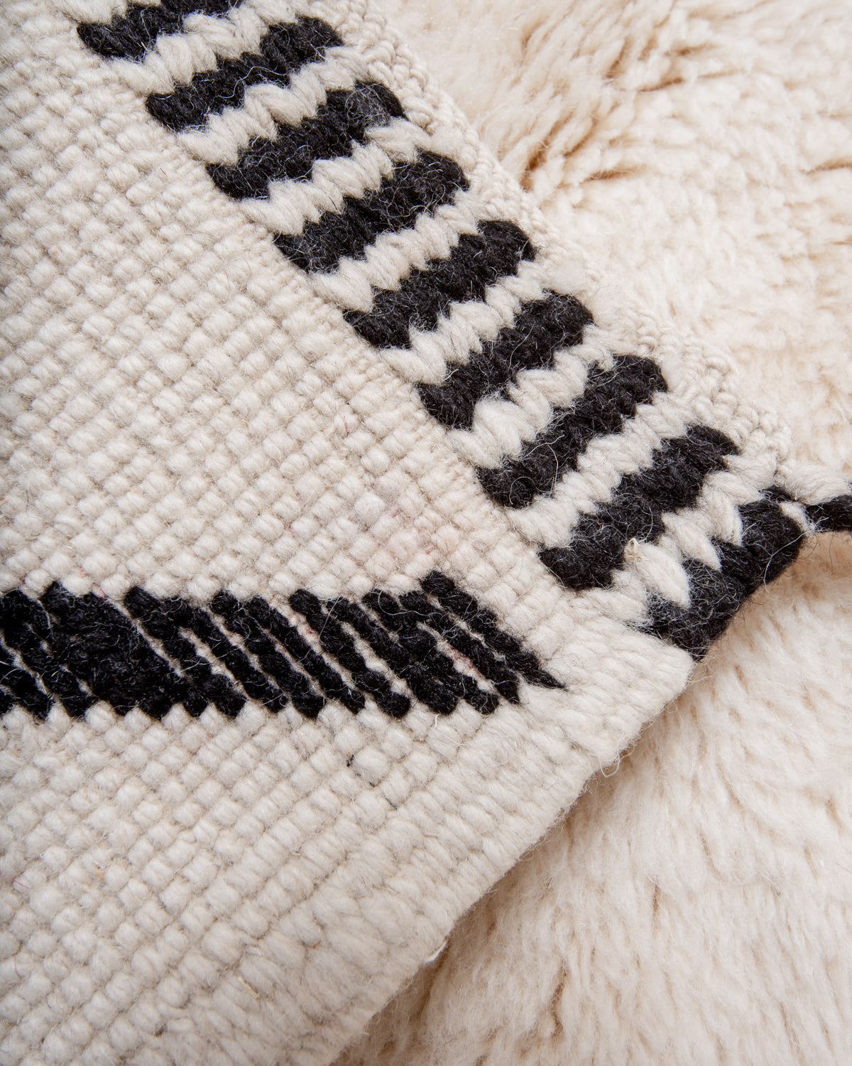 Modern, designer, handcrafted 100% sheep’s wool Berber rug from Morocco. Beni M’rirt carpet with beautiful colours and patterns and fluffy wool texture.